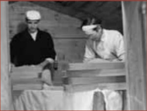 Black-and-white picture of workers making miso