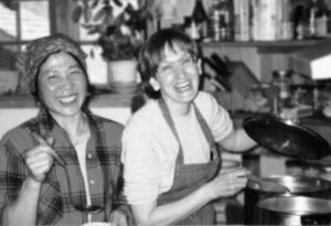 Laughing workers in a kitchen