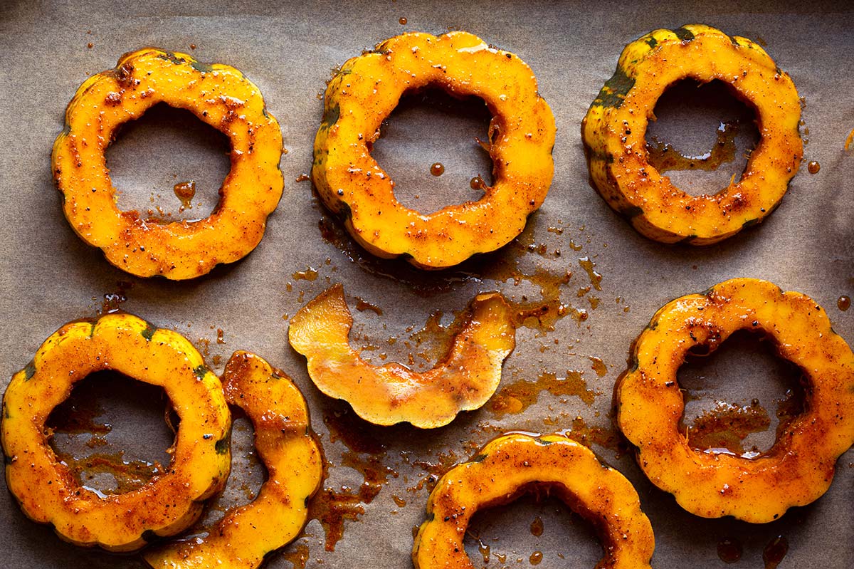 Delicata Squash rounds on baking sheet