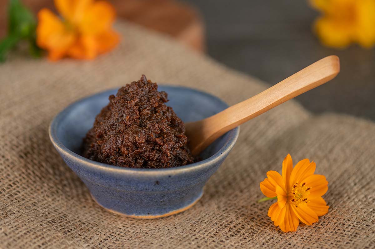 Dollop of miso in a blue bowl with flowers