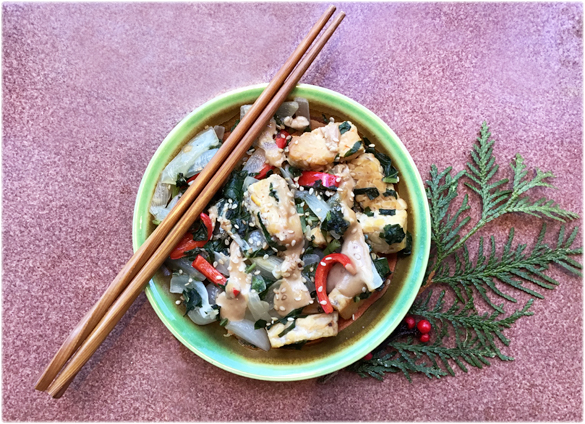 soup with Vegetables with Tempeh and Miso Tahini Sauce with chopsticks